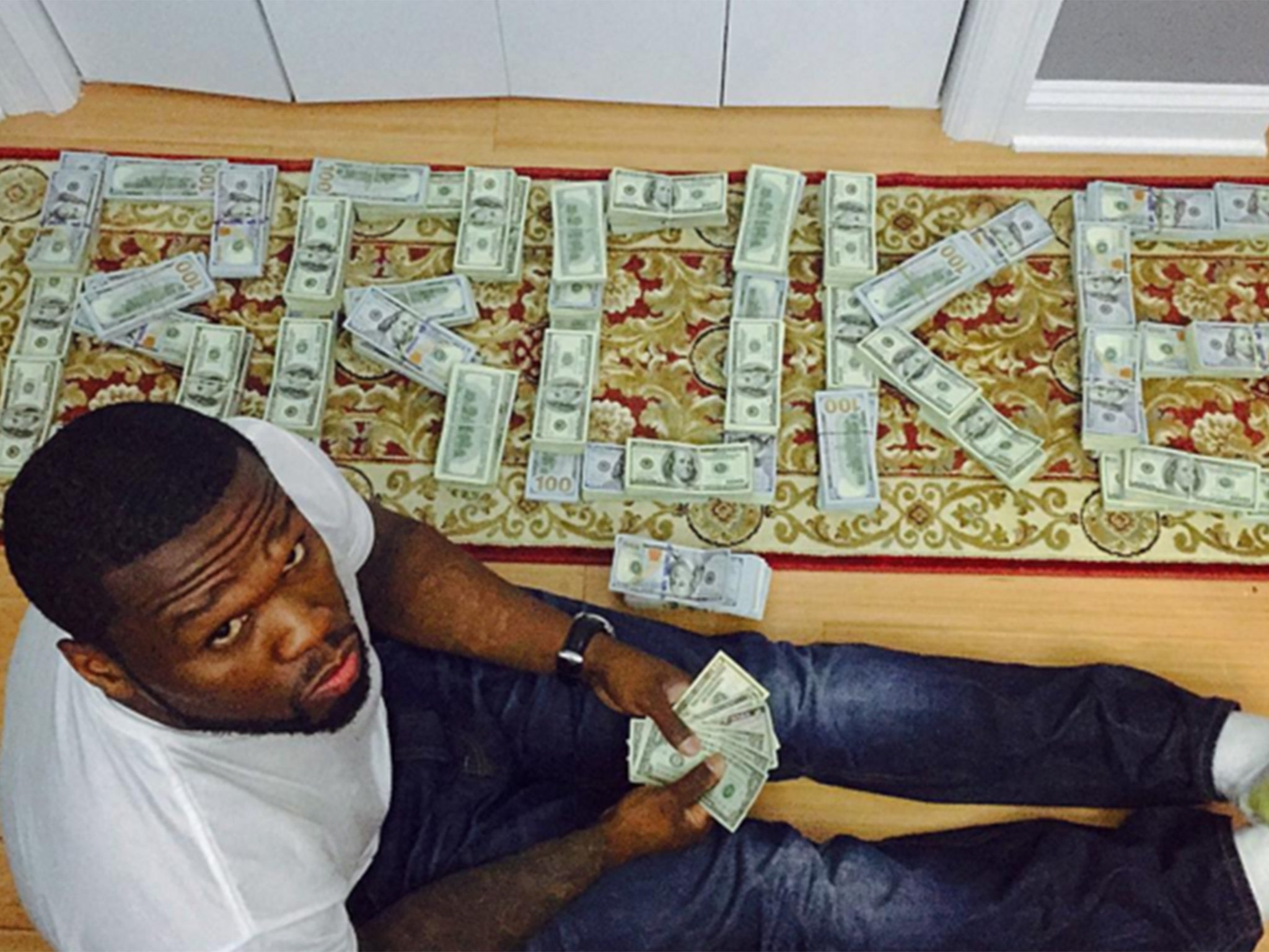 ‘Broke’ 50 Cent ordered to court after posing with cash on Instagram