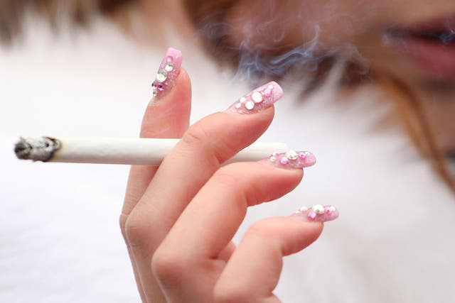 More young women are smoking, as the rate of young male smokers continues to drop