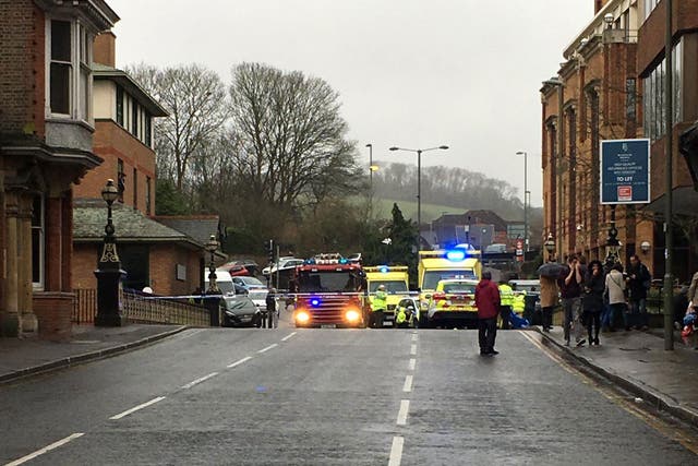 Emergency vehicles block off the street in Guildford