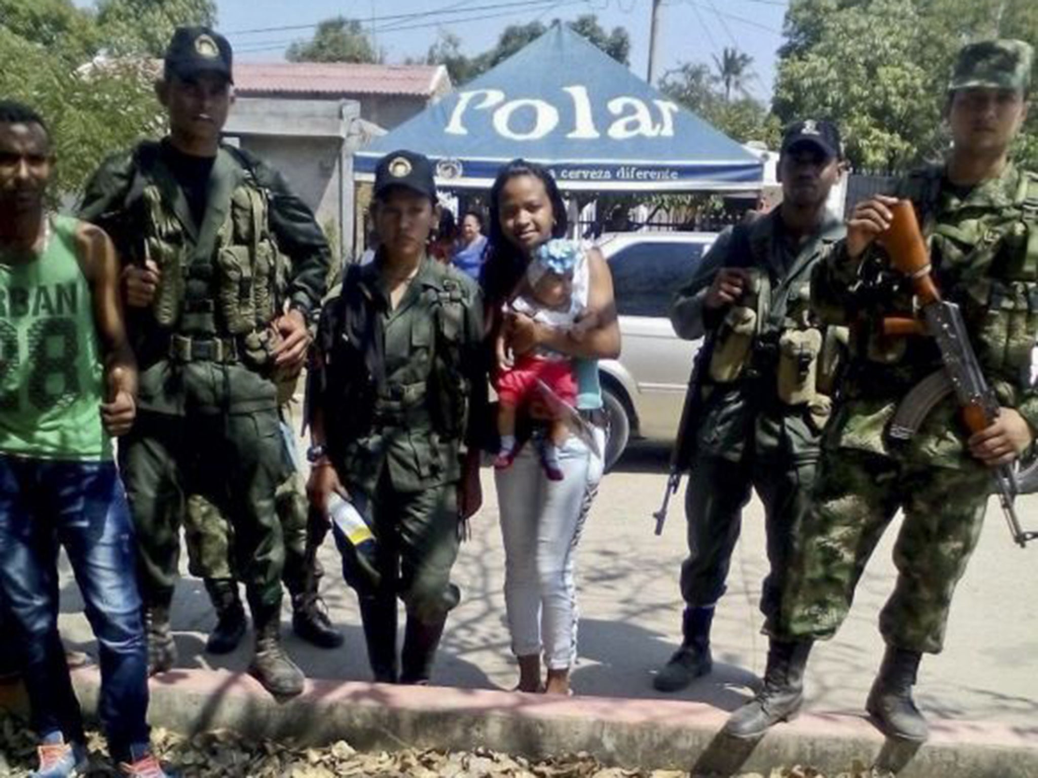 Colombian FARC leftist guerrillas pose for a photo in the village of El Conejo, La Guajira
