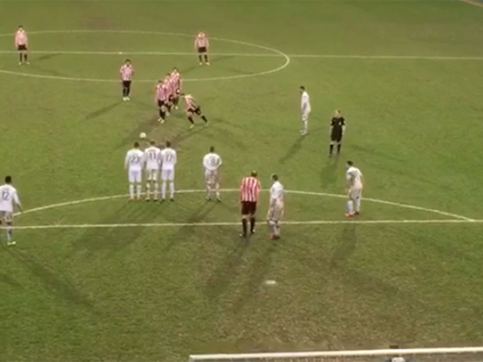 Five Cheltenham players line up to take the free-kick
