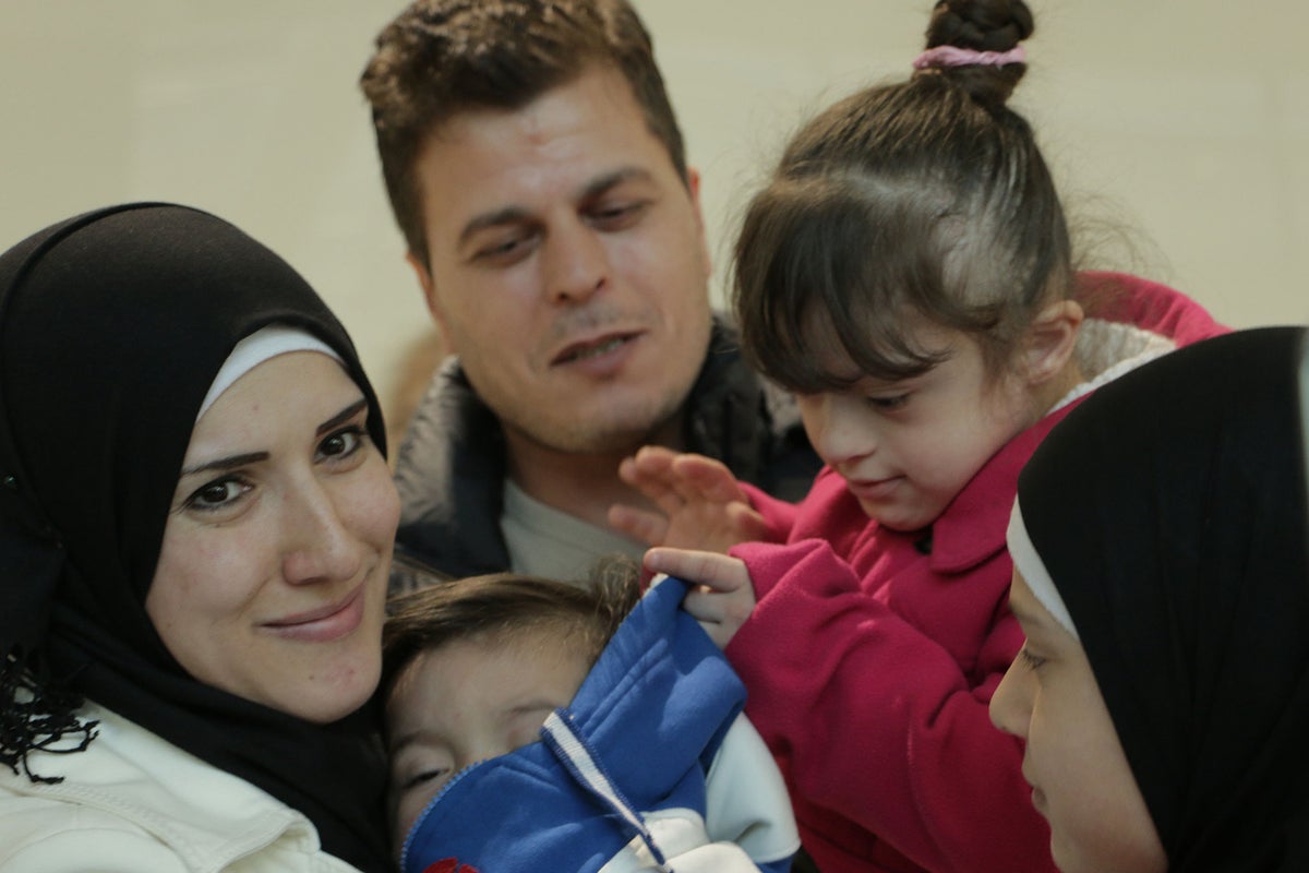 Syrian refugee living in Wales reunited with infant son after months ...