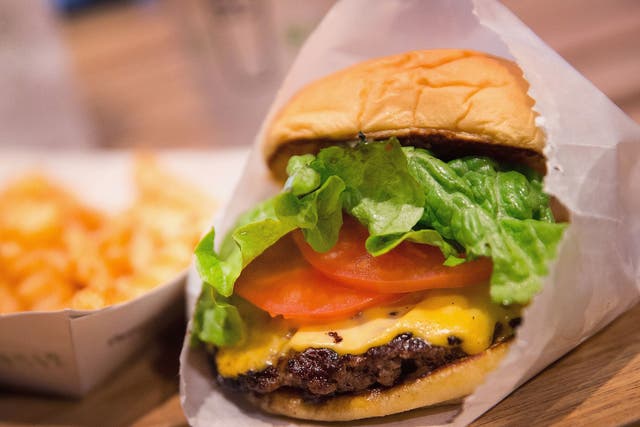Workers in the UK could buy two and a half burgers for each hour worked on the minimum wage