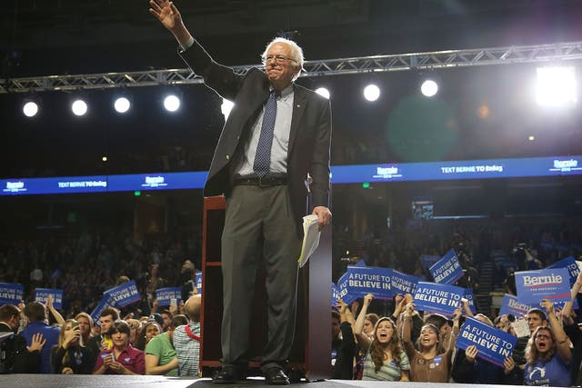 Democratic presidential candidate Sen. Bernie Sanders waves after speaking during a Future to Believe In rally at the Bon Secours Wellness Arena in Greenville, South Carolina.