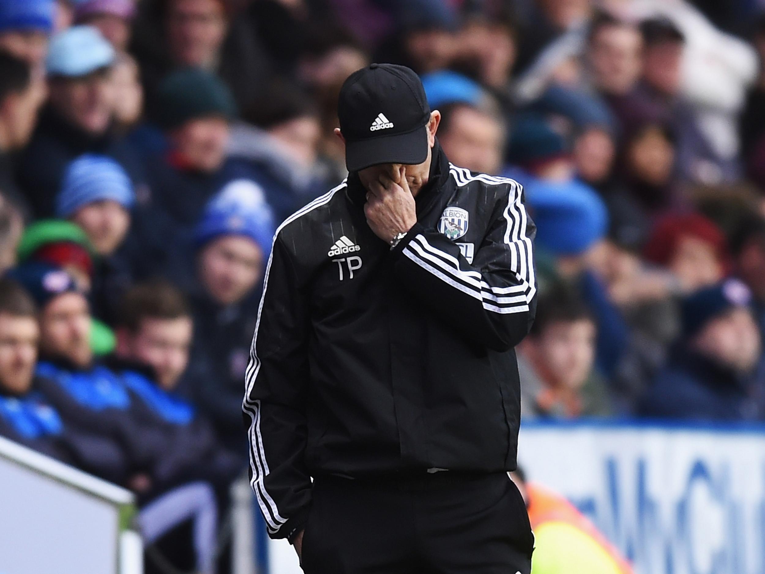 West Brom manager Tony Pulis appears dejected after the loss to Reading in the FA Cup
