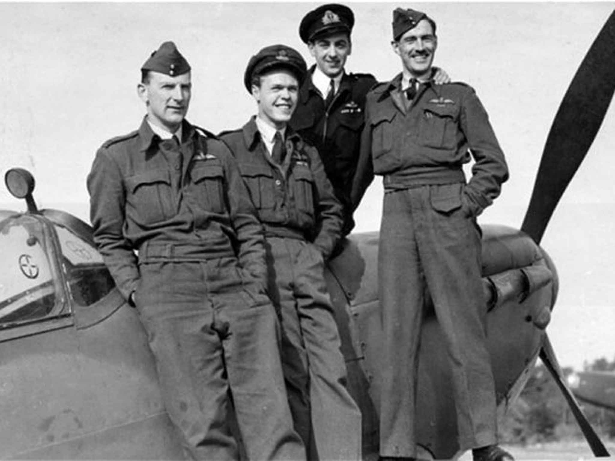 Brown (dark uniform) with fellow test pilots; in all he flew 487 different types of aircraft