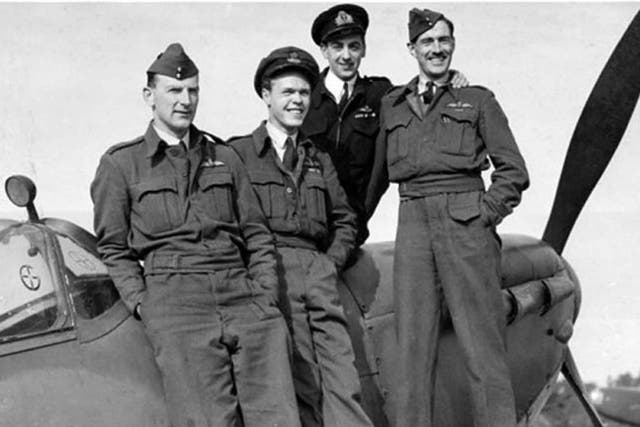 Brown (dark uniform) with fellow test pilots; in all he flew 487 different types of aircraft