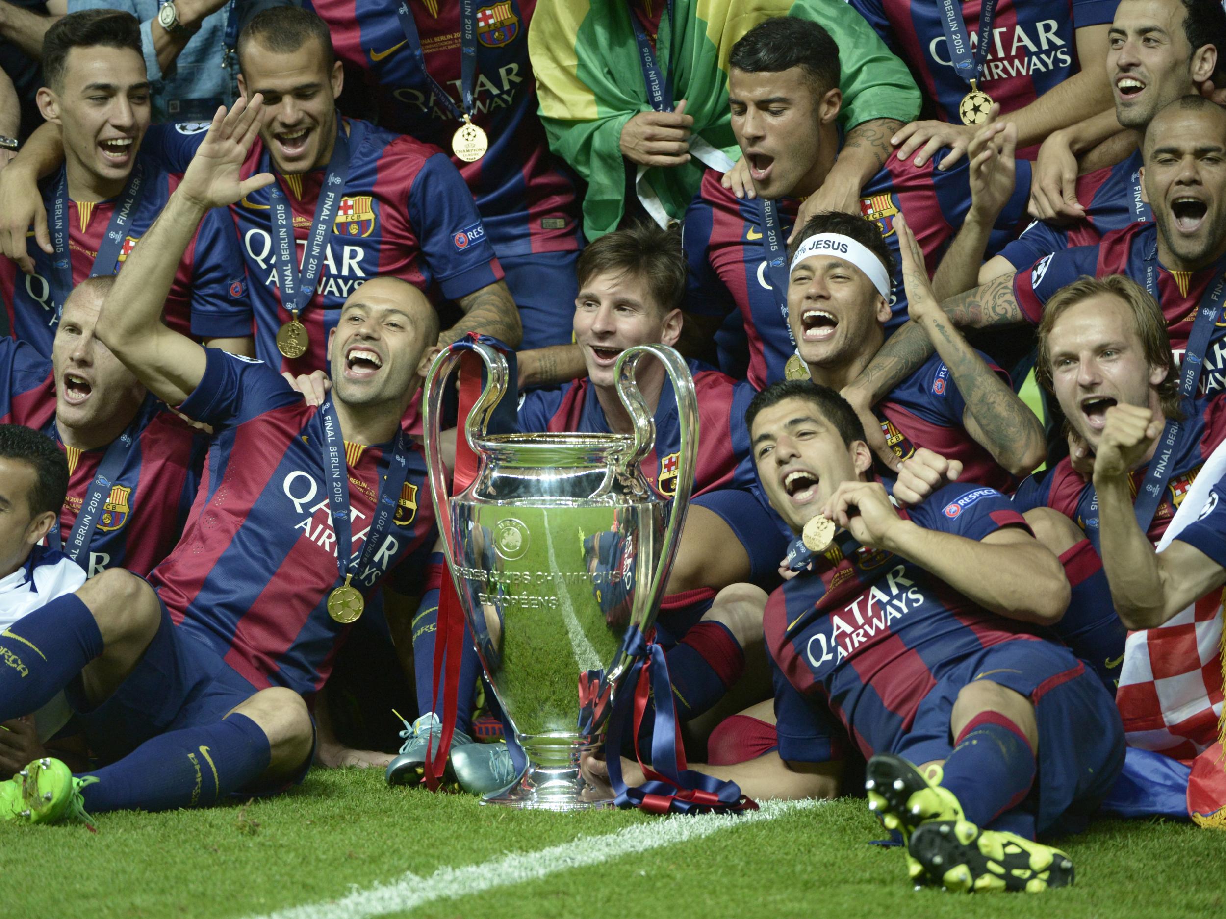 Barcelona players including Lionel Messi and Luis Suarez celebrate winning the Champions League in 2015