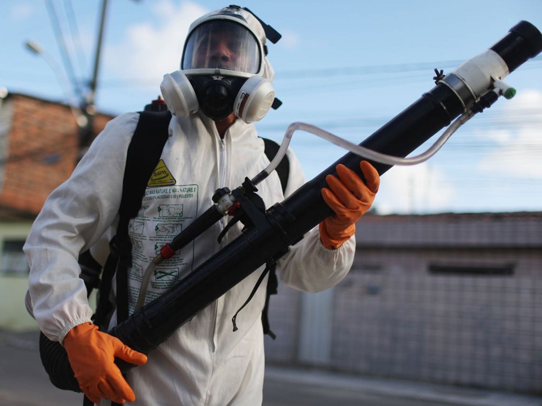 A health worker fumigates in an attempt to eradicate the mosquito which transmits the Zika virus in Recife, Pernambuco state, Brazil.