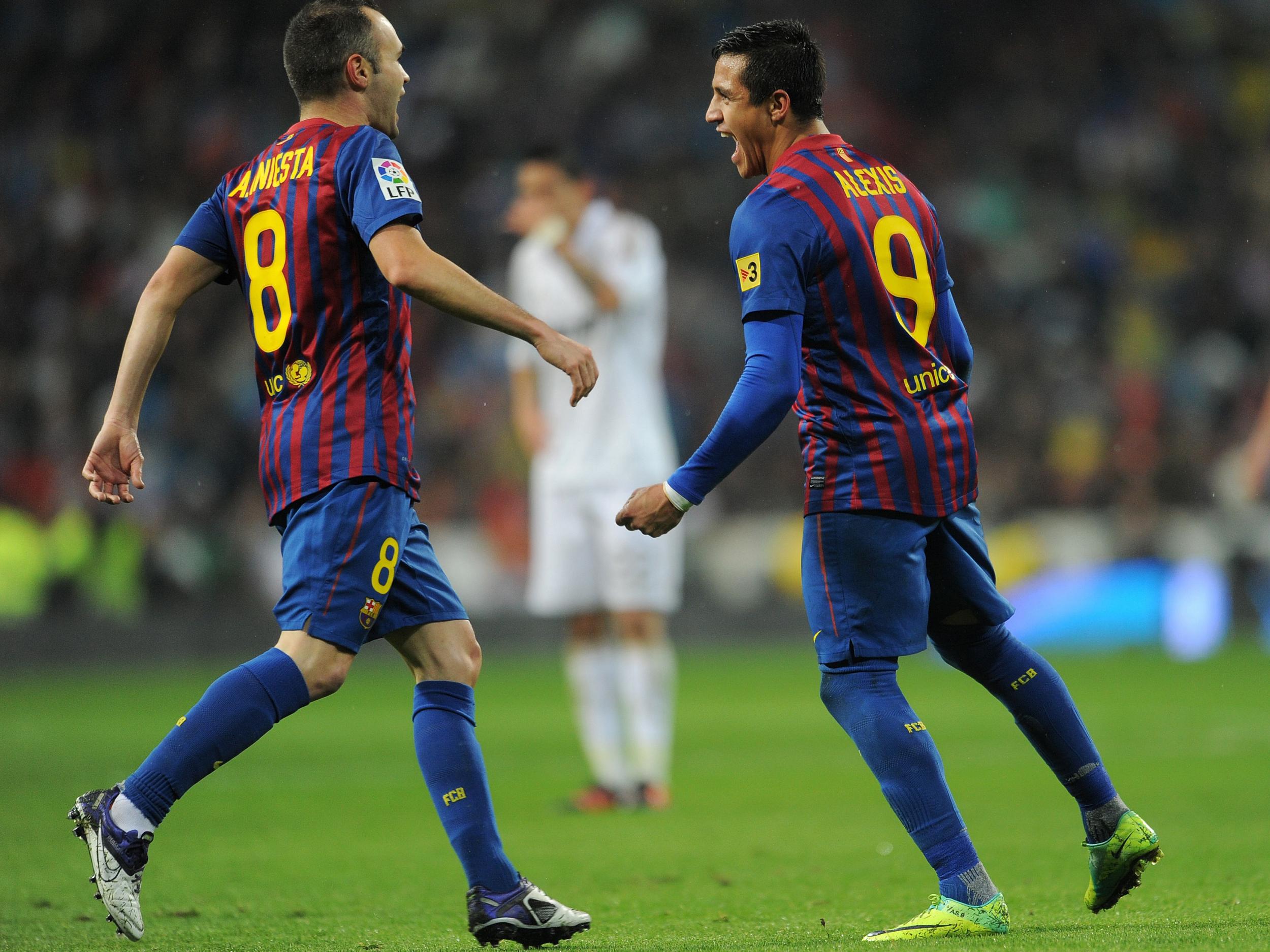 Andres Iniesta and Alexis Sanchez during their time together at Barcelona