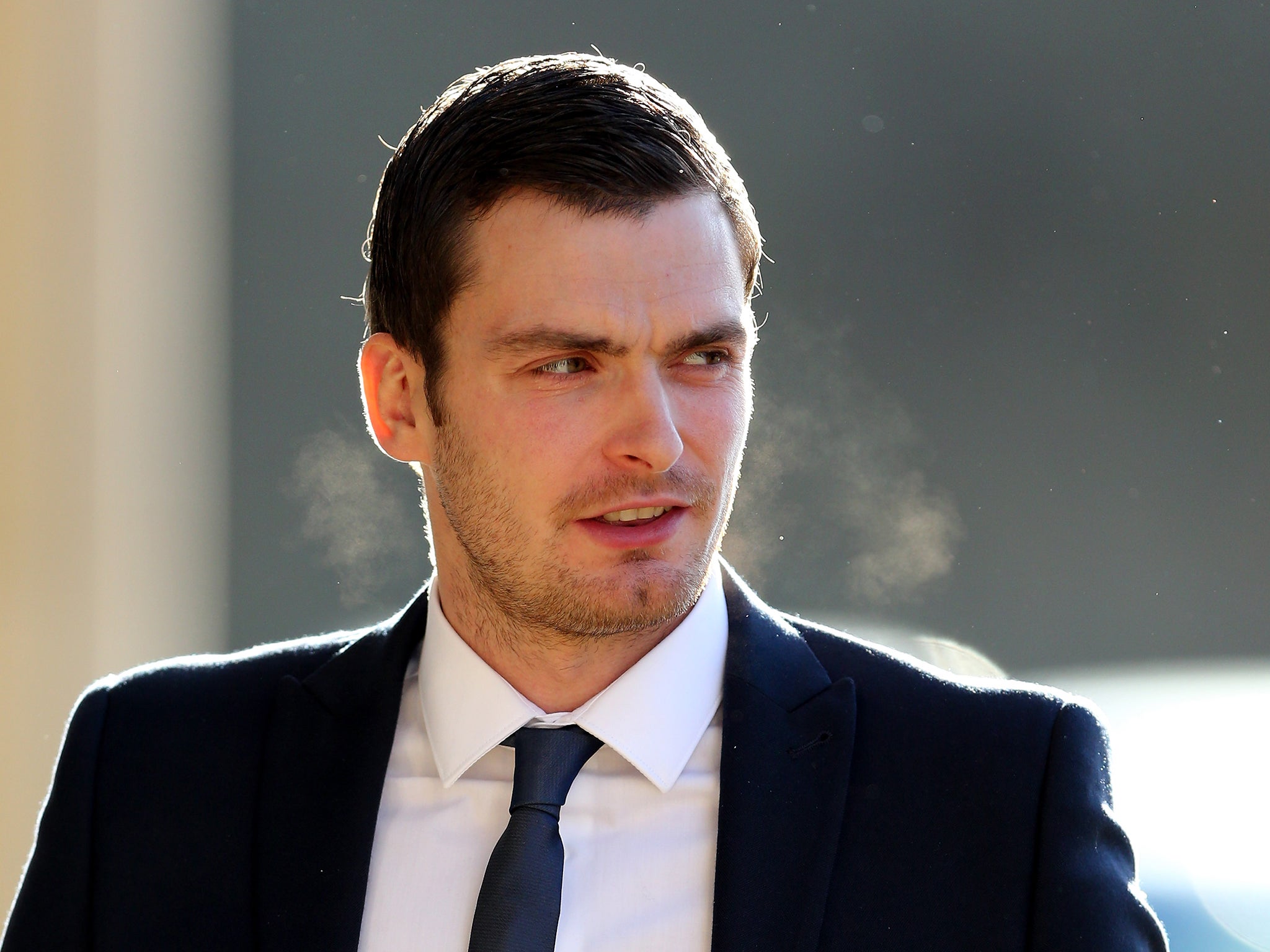 Footballer Adam Johnson arrives at Bradford Crown Court to give evidence in Bradford