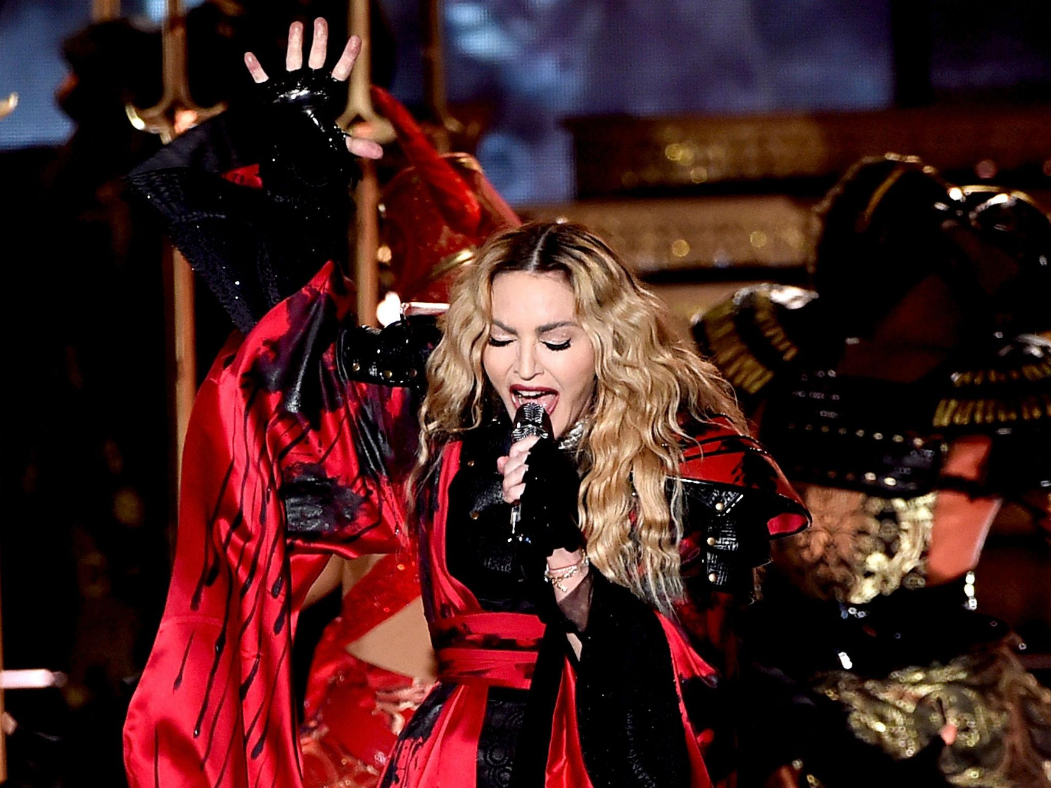 Singer Madonna performs during her 'Rebel Heart' tour at the Forum on October 27, 2015 in Inglewood, California