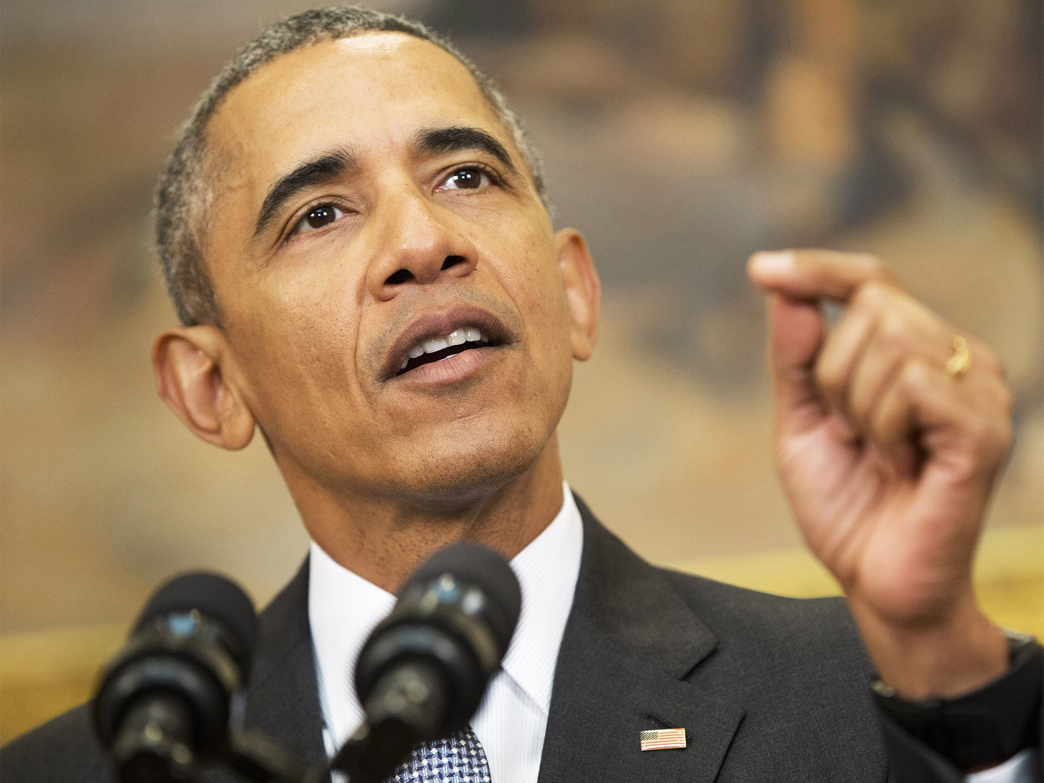 &#13;
Barack Obama announcing the plan at the White House &#13;