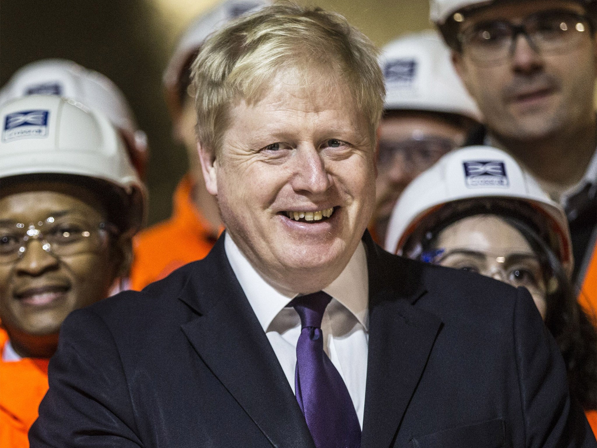 Boris Johnson with workers at the new Crossrail Bond Street station
