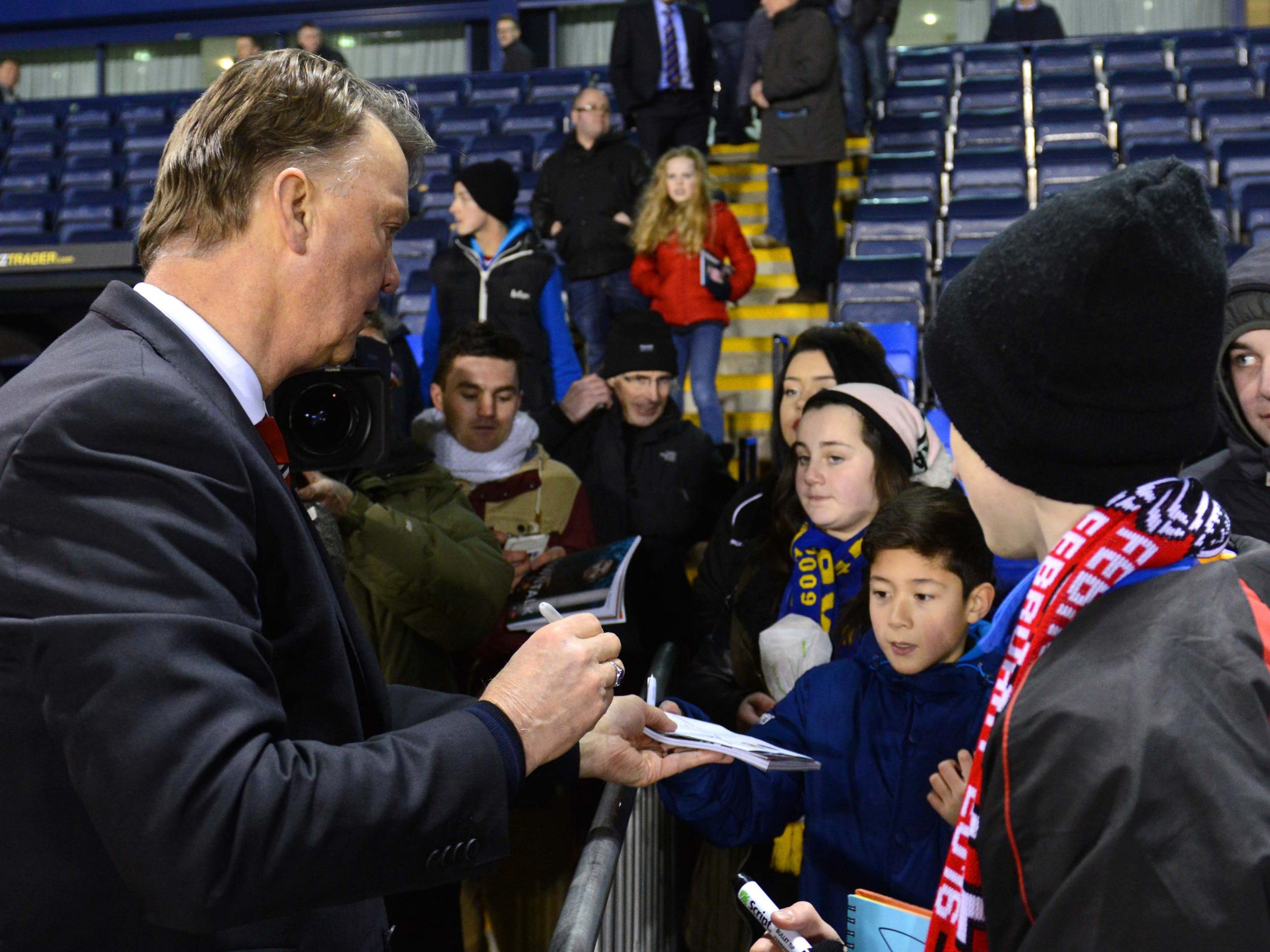 Louis van Gaal jokes with Manchester United and Shrewsbury fans