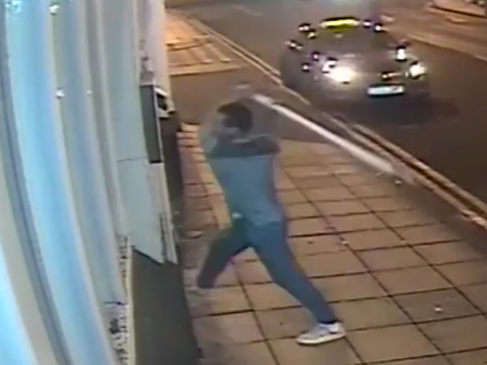 CCTV shows man attack pub with five-foot pole after allegedly being ...