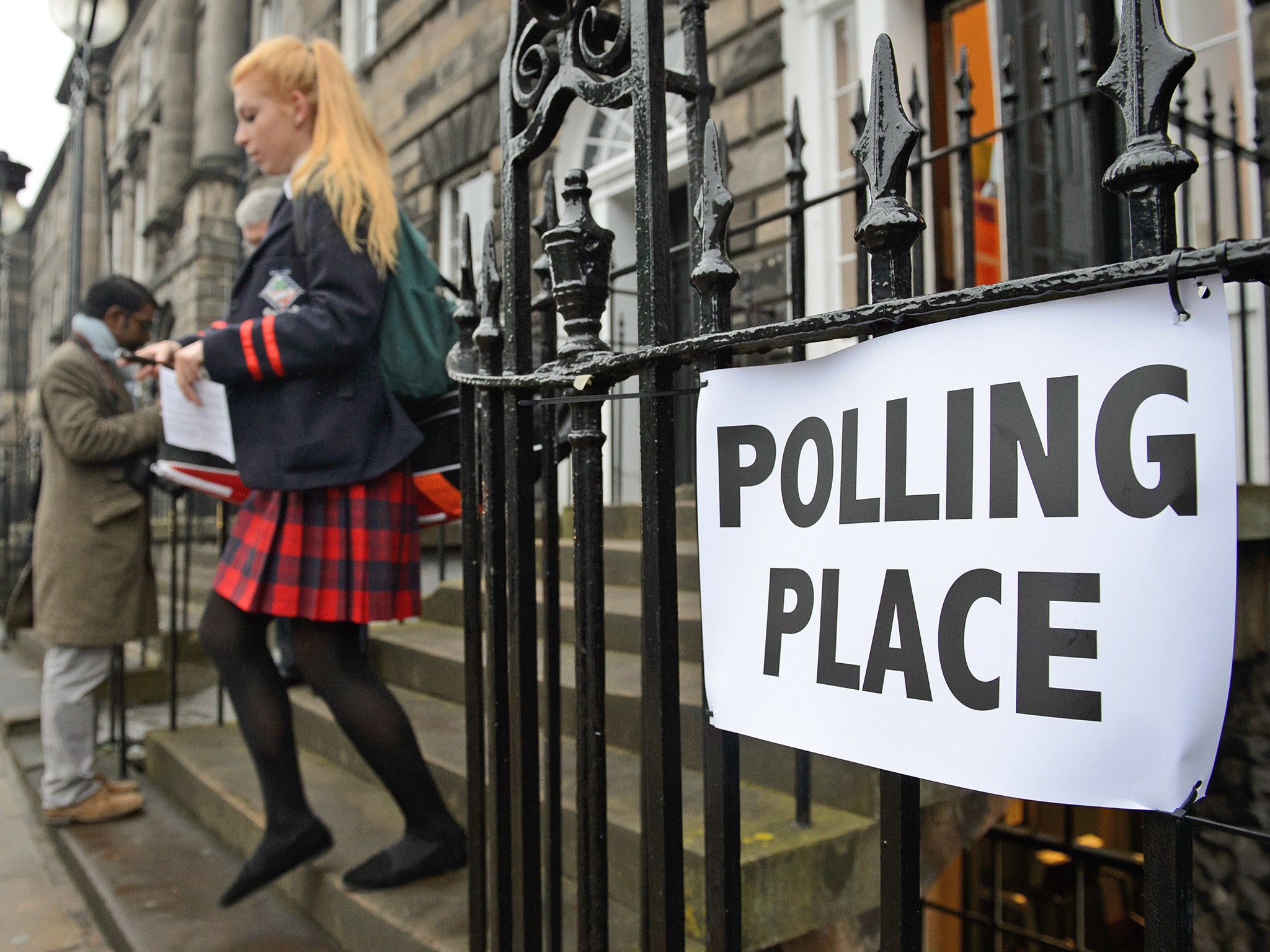 A young voter leaves a polling station after casting her vote during the 2014 referendum on Scotland’s independence