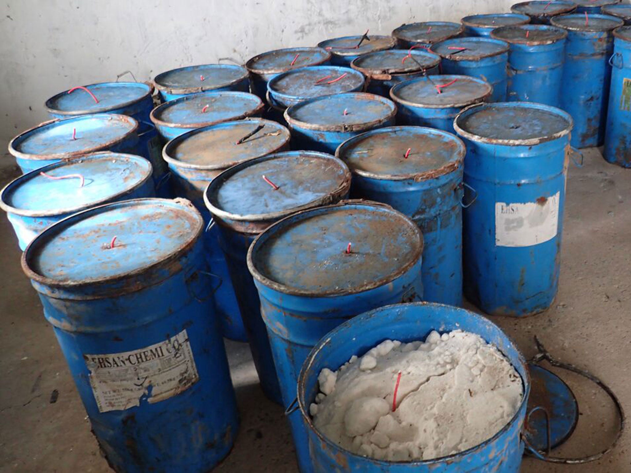 White petroleum drums manufactured in Iran found near the Mosul Dam in Iraq, February 2015