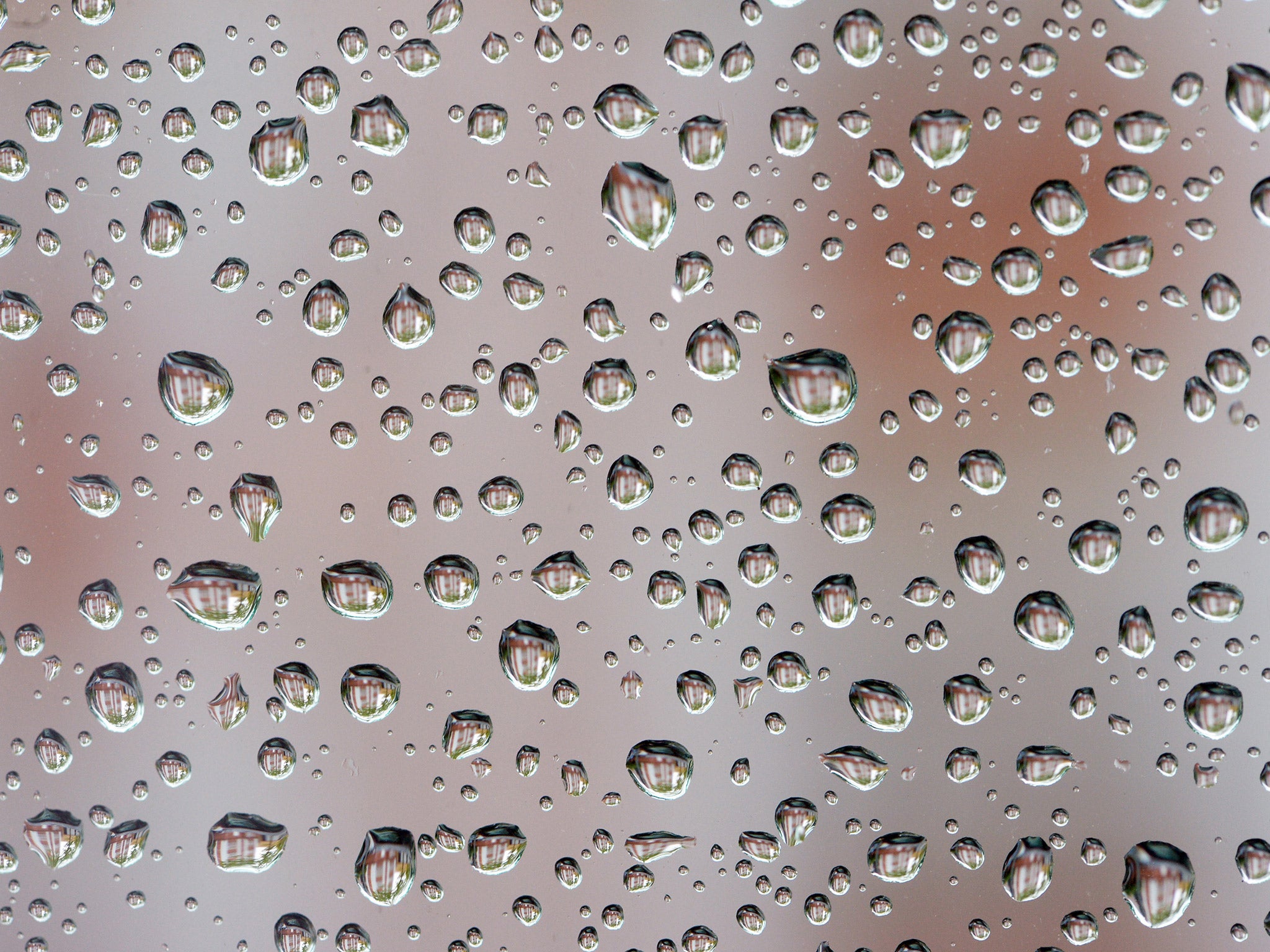 Condensation on a window. Researchers have designed a surface to capture and store water droplets