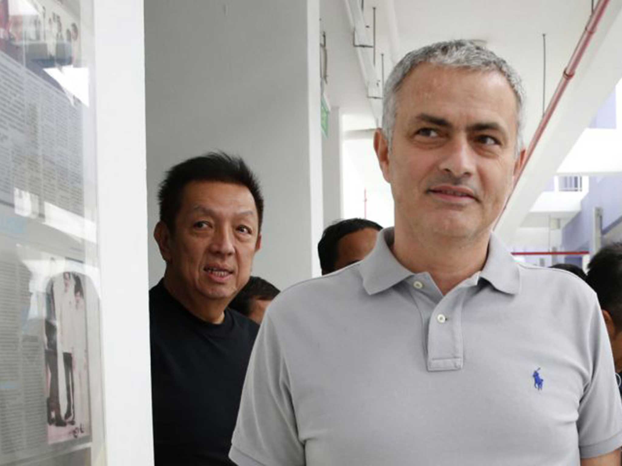 Jose Mourinho with Valencia owner Peter Lim in Singapore