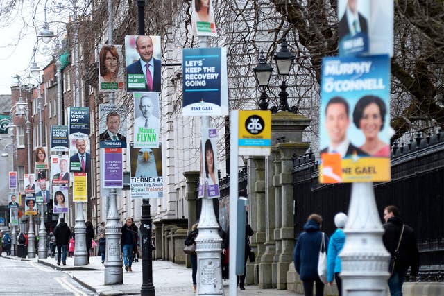 Election posters dominate the view outside Government Buildings in Dublin but almost 30 per cent of the electorate is expected to abandon the traditional parties in favour of independents