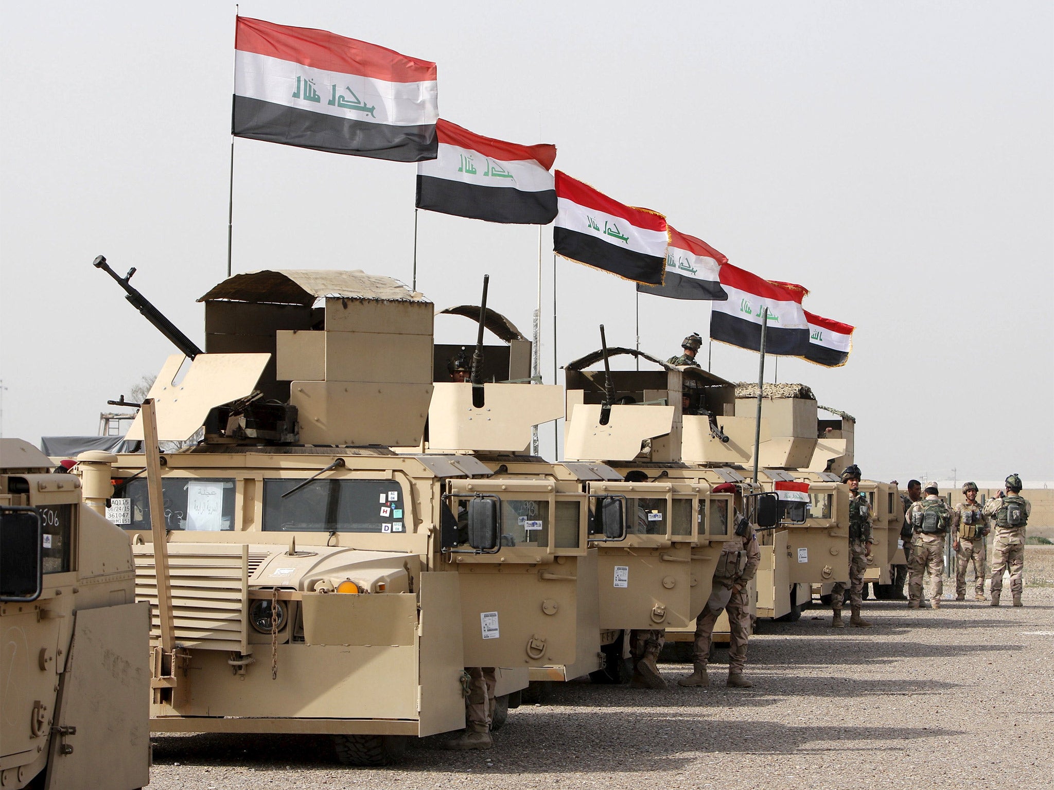 Iraqi security forces in Baghdad on Monday, preparing to travel to Mosul to fight Isis