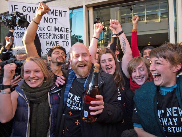Some of the 13  climate change activists celebrate outside Willesden magistrates’ court