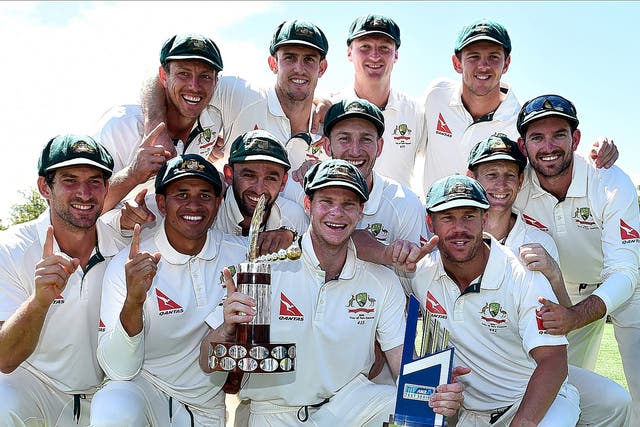 Australia celebrate their series win over New Zealand in Christchurch, a victory which took them back to the top of the Test rankings