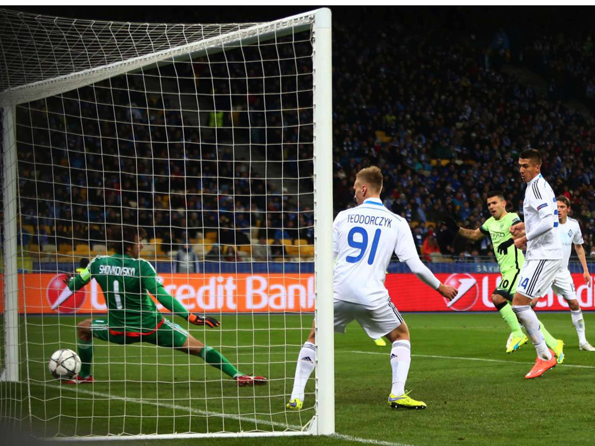 Aguero (third from right) reacts fastest to score Manchester City’s first goal in Kiev