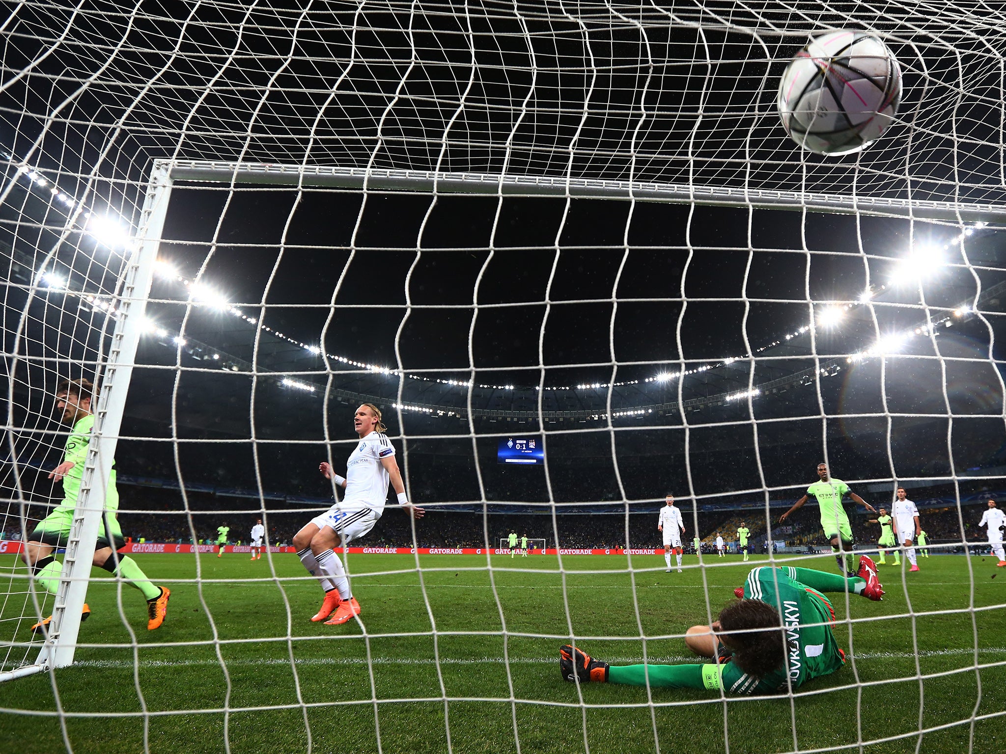 David Silva (left) wheels away after making it 2-0 to the Premier League side