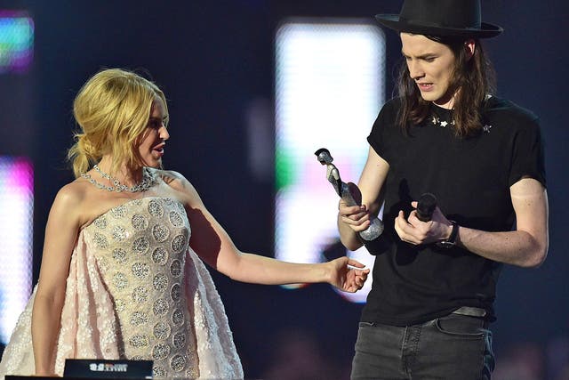 James Bay receives his Best British Male Solo Artist award from Kylie Minogue