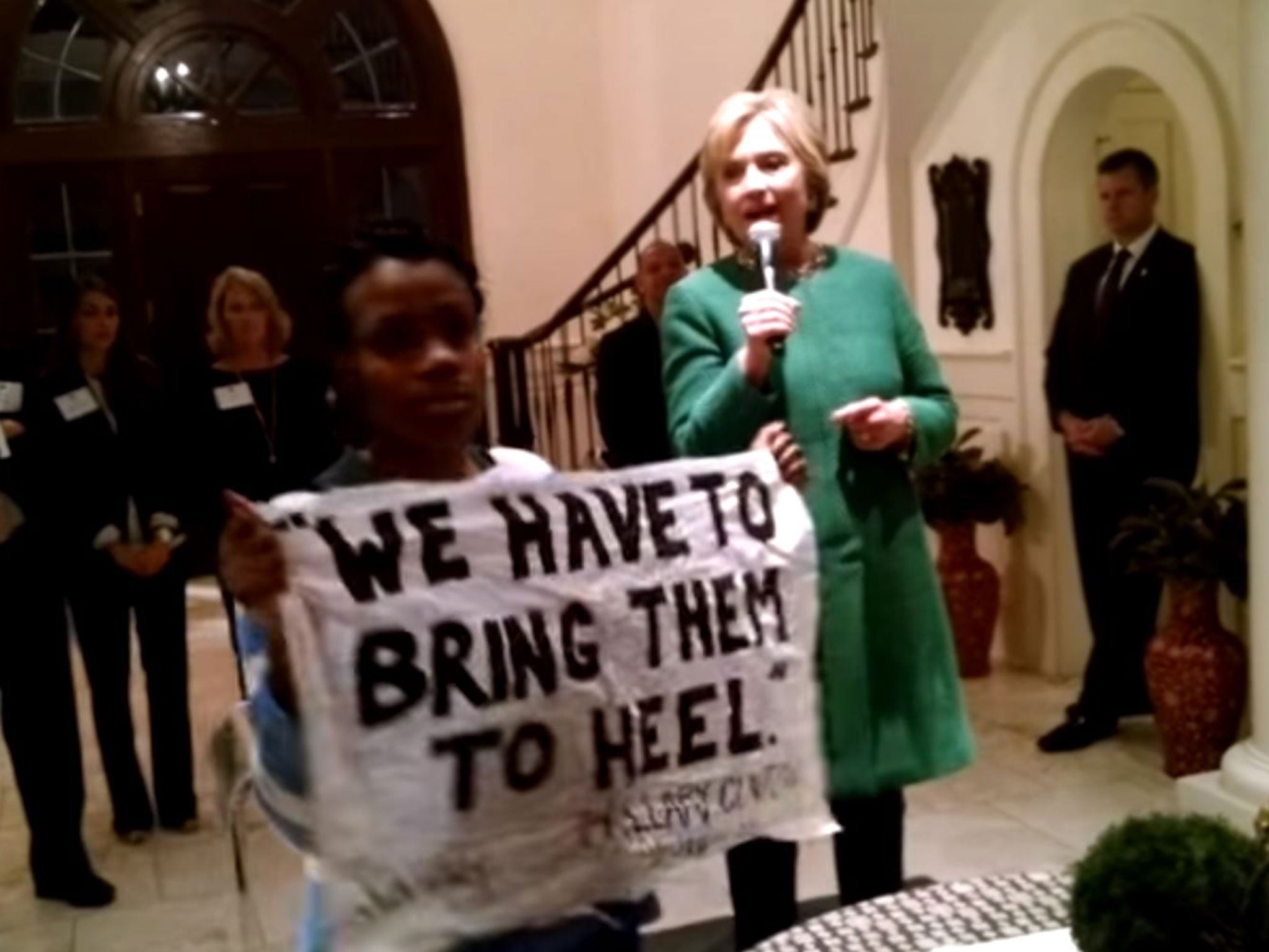 A BlackLivesMatter protester interrupting Hillary Clinton this week