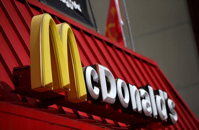 Staff from two McDonald's restaurants are staging a walkout