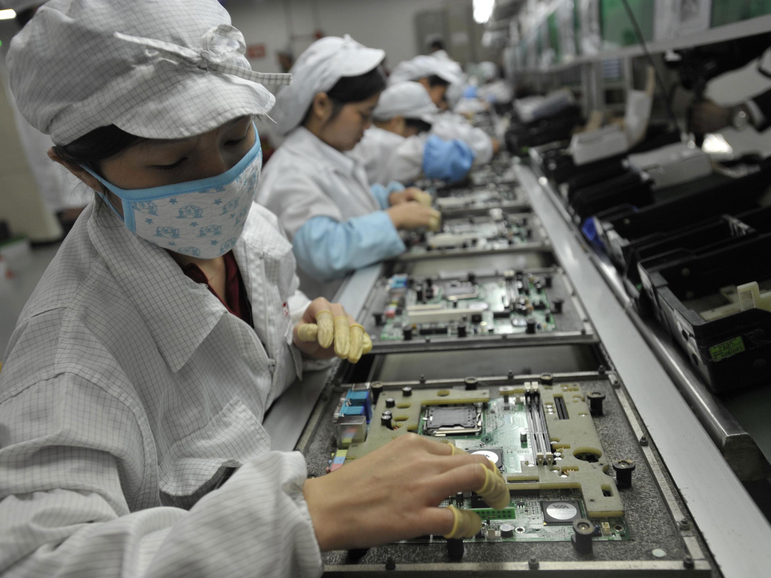 Chinese workers in the Foxconn factory in Shenzhen, in southern China's Guangdong province.