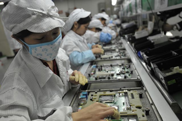 Chinese workers in the Foxconn factory in Shenzhen, in southern China's Guangdong province.