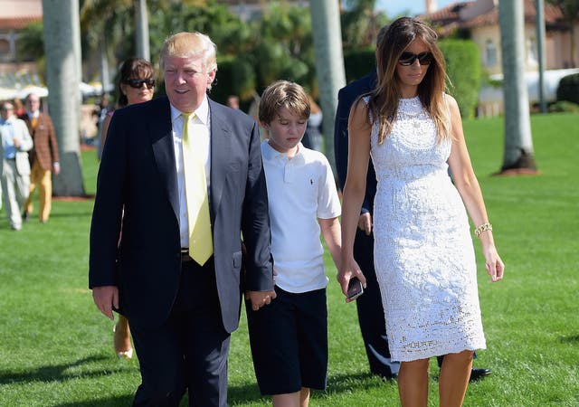 Donald Trump at Mar-a-Lago Club with his wife, Melania, and son, Barron.
