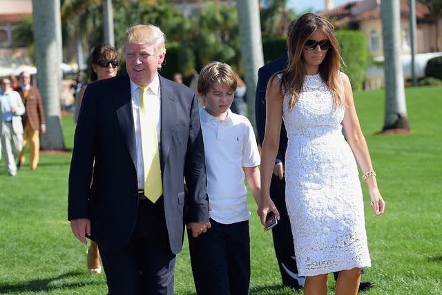Donald Trump at Mar-a-Lago Club with his wife, Melania, and son, Barron.