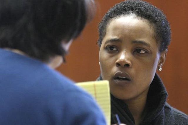 Haniyyah Barnes, right, was sentenced to four years in prison for throwing her neighbor's dog into traffic over a parking dispute.
