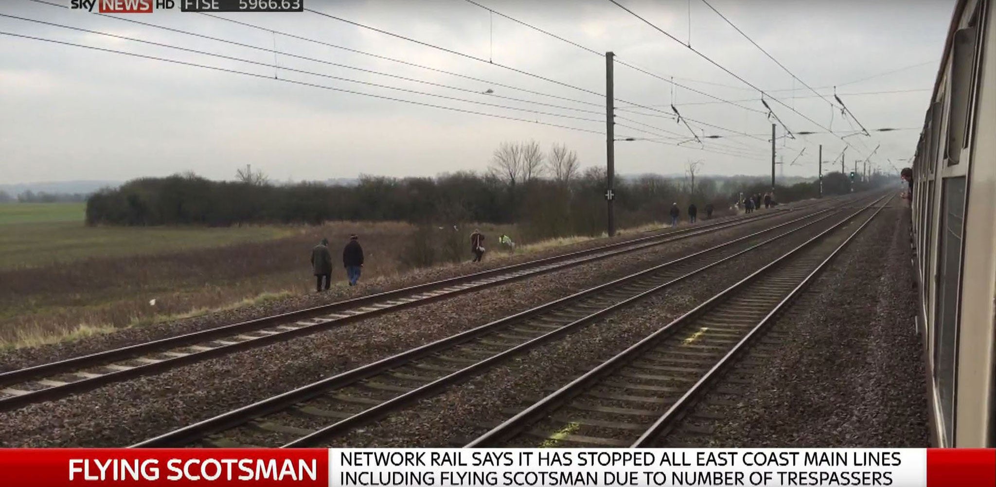 Footage filmed from the train showed people walking down the line