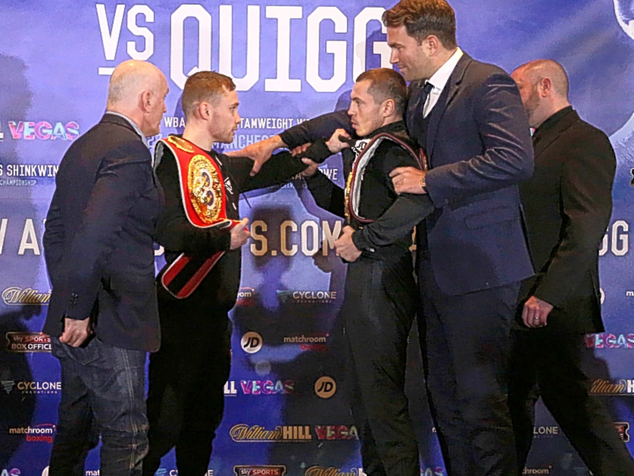 Carl Frampton (centre left) and Scott Quigg square off after the press conference in Manchester