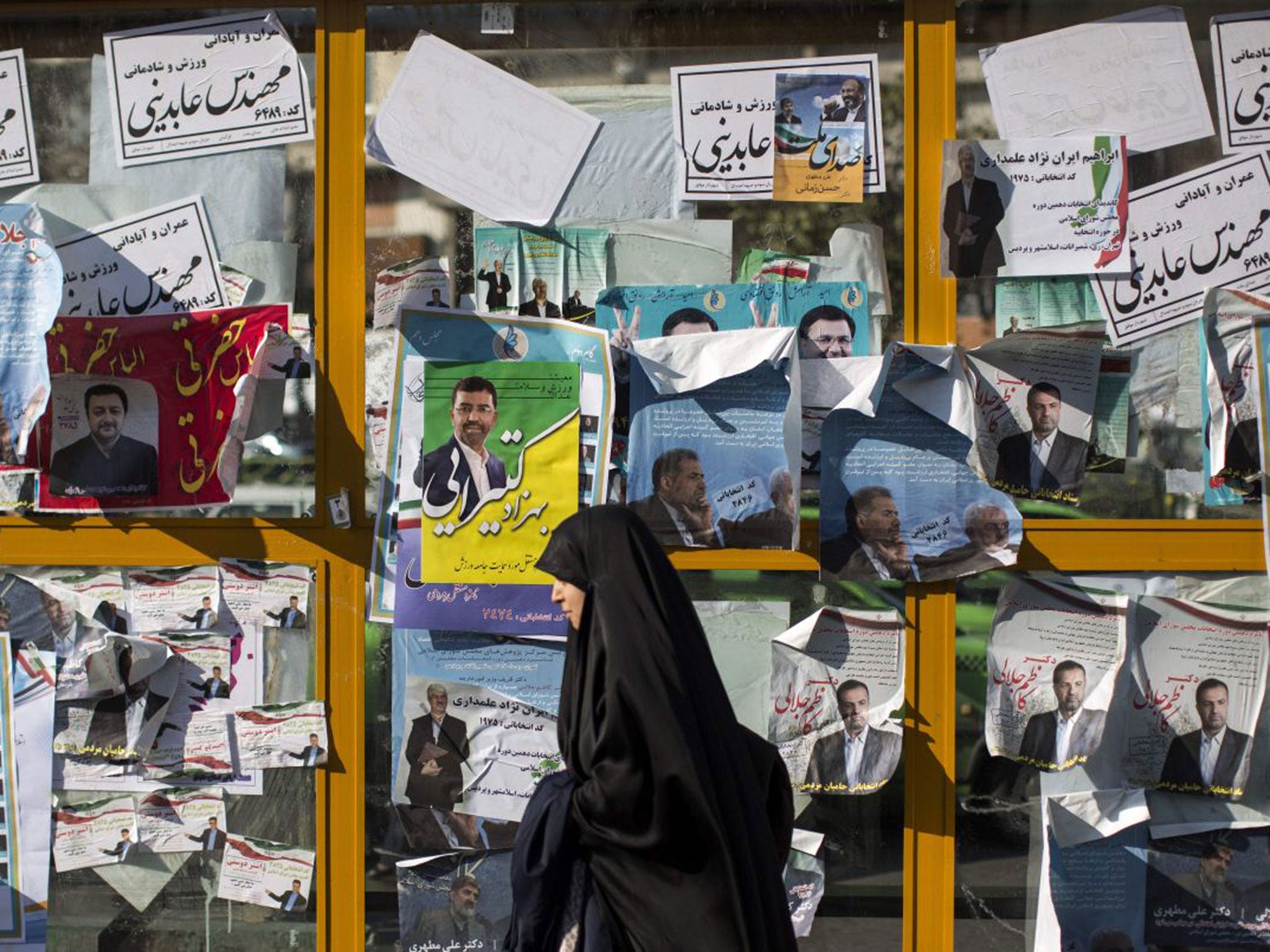 Election posters in Tehran; the Supreme Leader stressed wives did not need their husbands’ permission to vote