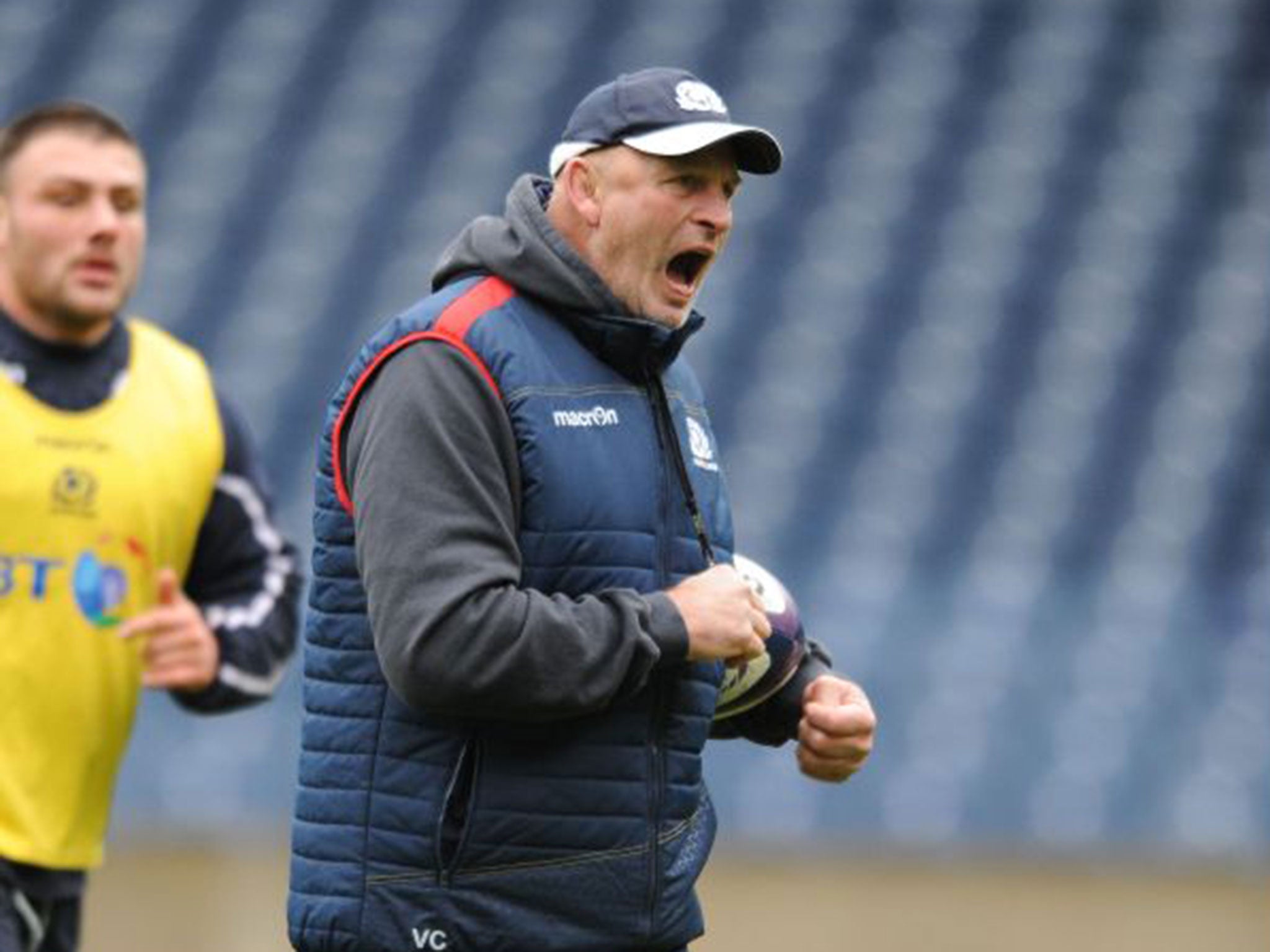 Vern Cotter offers some words of wisdom during Scotland training