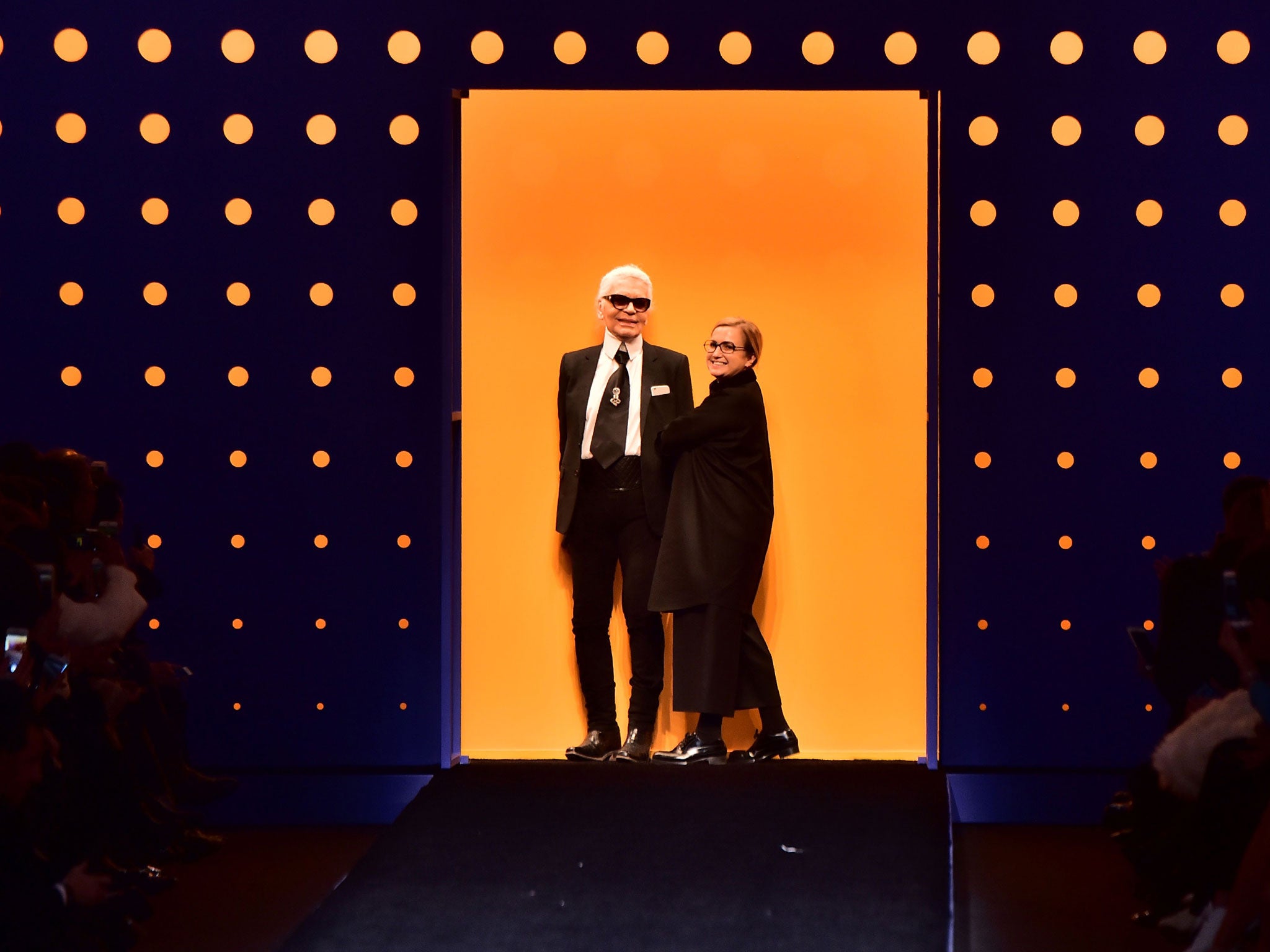 Karl Lagerfeld, left, designs Fendi's clothes, while Silvia Venturini Fendi has responsibility for accessories (Getty)