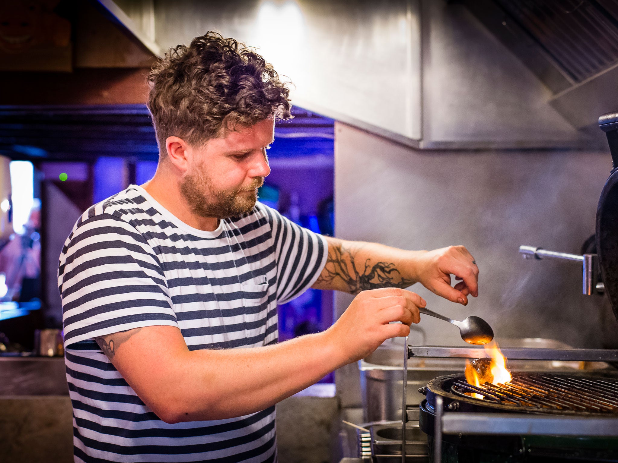 Robin cooking the duck hearts for his fermented barley dish