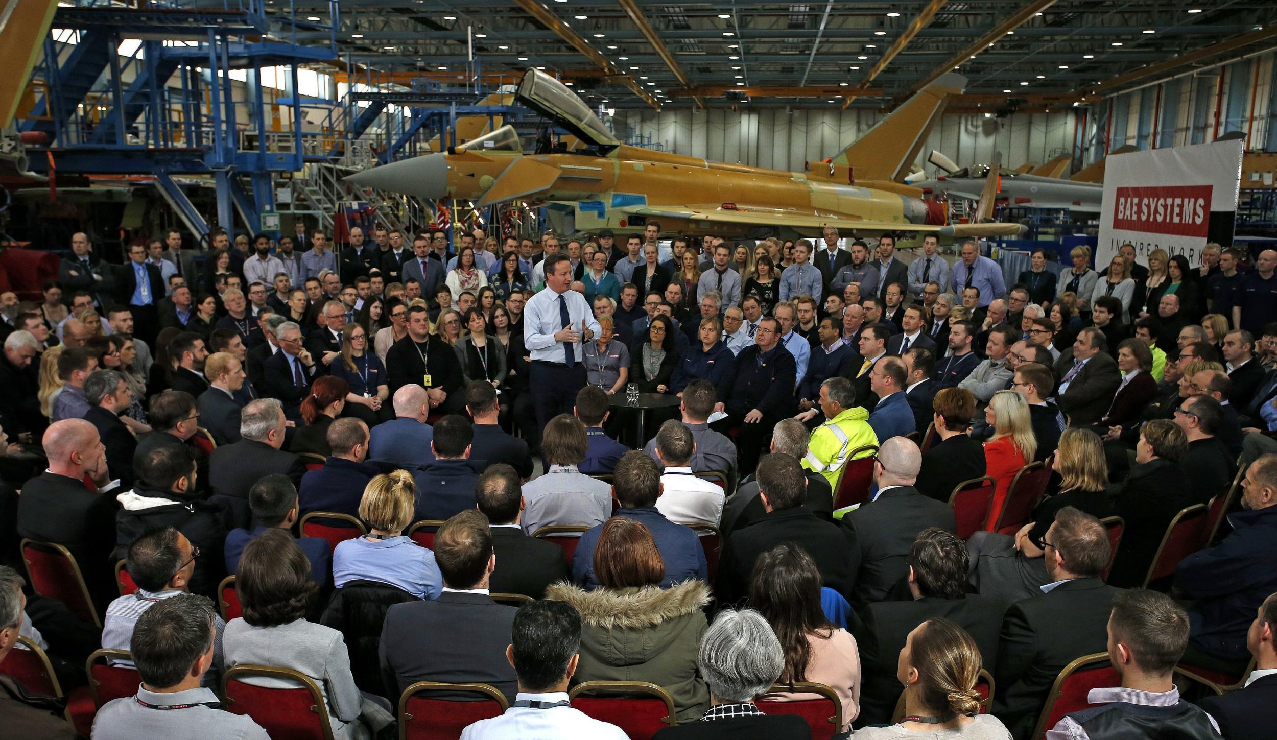 Prime Minister David Cameron speaking in front a Eurofighter Typhoon to BAE Systems employees
