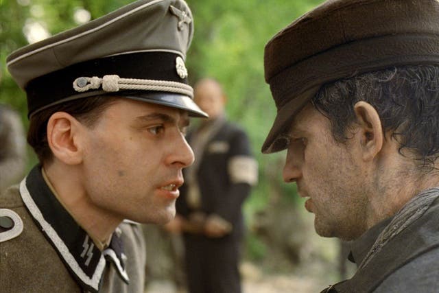 Christian Harting, left, and Geza Rohrig in a scene from "Son of Saul.