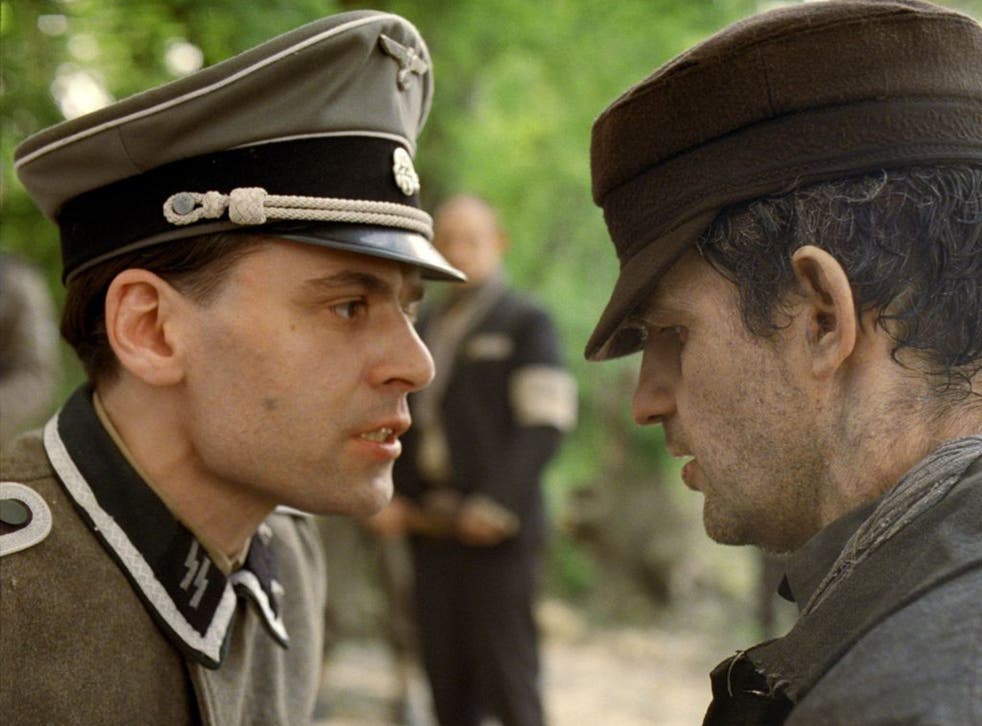 Christian Harting, left, and Geza Rohrig in a scene from "Son of Saul.