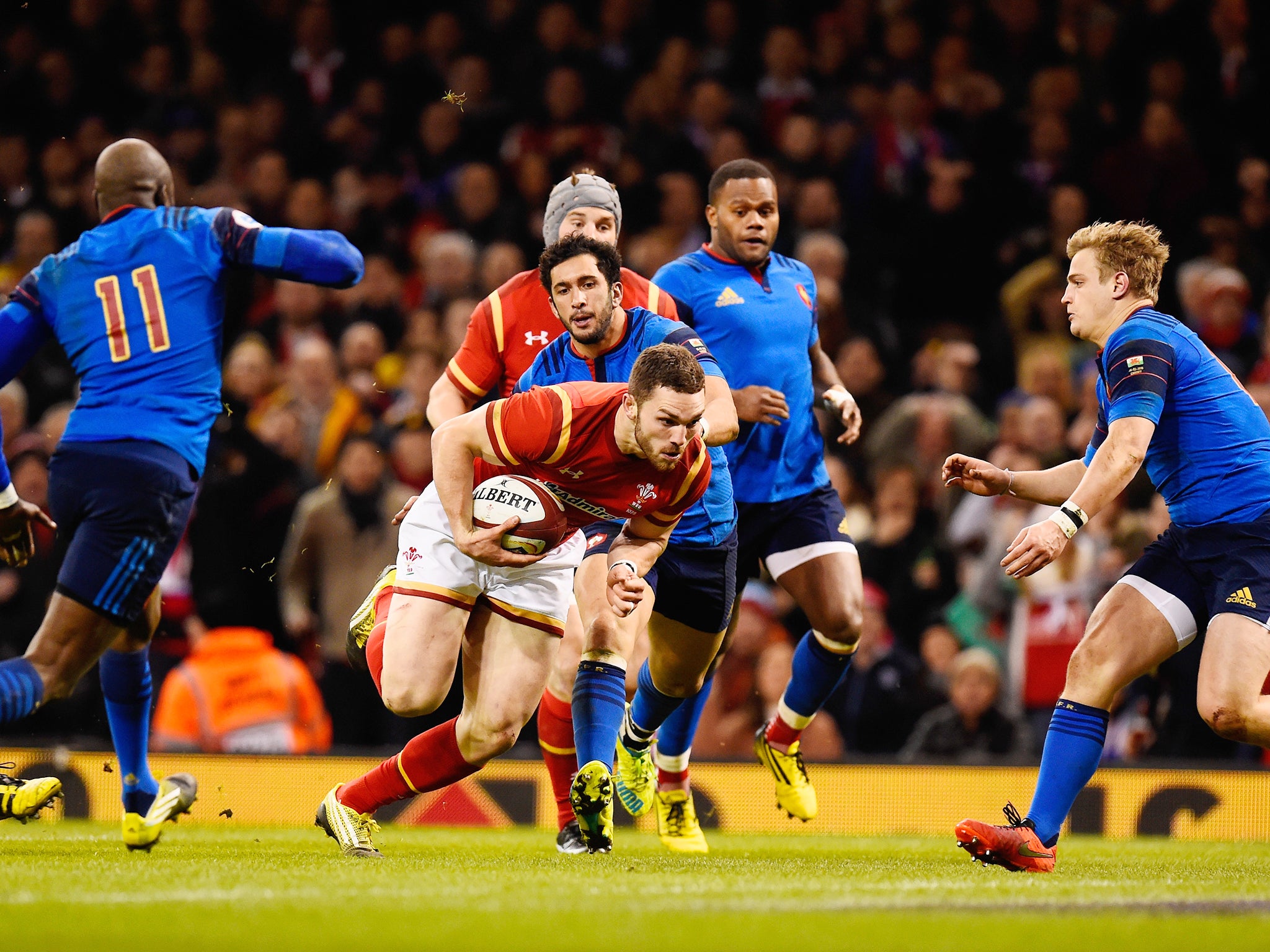 George North of Wales crashes over the line to score the opening try during the RBS Six Nations match between Wales and France at the Principality Stadium.