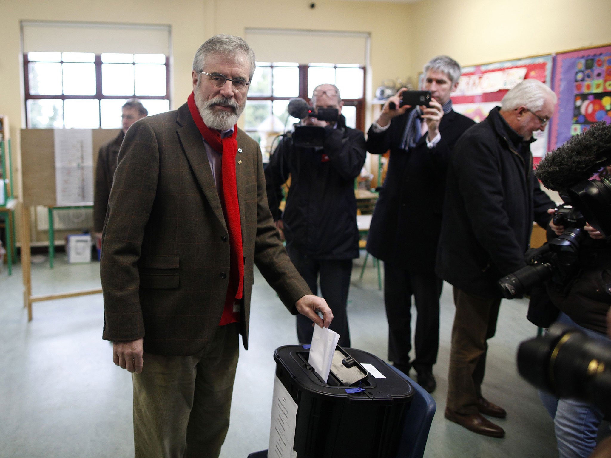 Sinn Fein leader Gerry Adams casts his vote