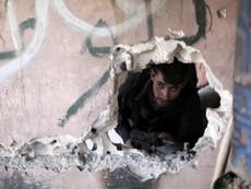 Rebels claim Assad forces dropping barrel bombs hours into ceasefire
